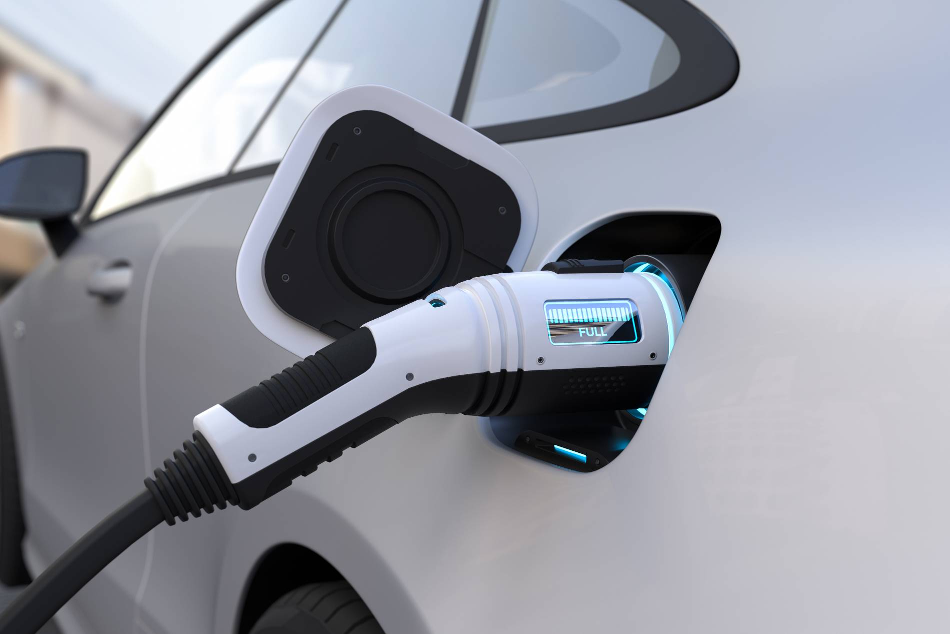 Véhicule électrique branché à une borne de recharge
